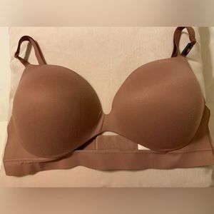 Victoria’s Secret padded bra.  Brand new.  Size 38C.  Peekaboo front.